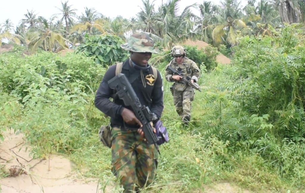 An Officer Of The Nigerian Navy Special Boat Service Left During The Five Week Joint Combined Exchange Training Jcet Alongside A Team Of U.s. Army Special Forces