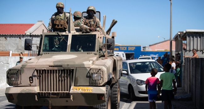 Soldiers Of The South African National Defence Force Sandf Ride In Their Mamba Armoured Vehicle